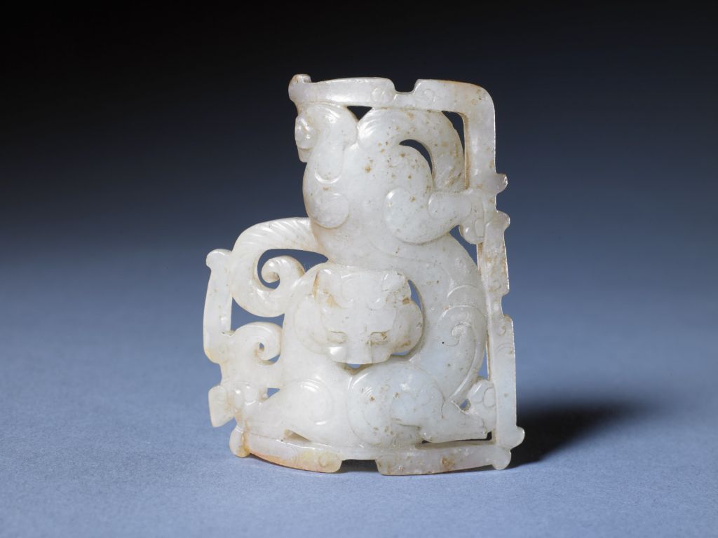 图片[1]-White jade carved dragon tiger sword-China Archive